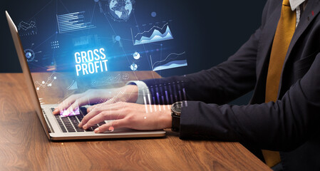 Businessman working on laptop, business concept