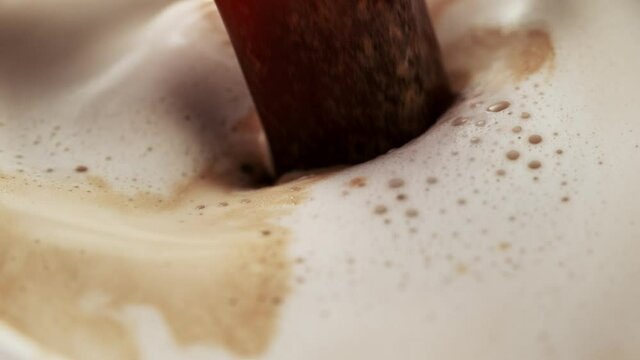 Super slow motion of pouring coffee in detail. Filmed on high speed cinema camera, 1000fps.