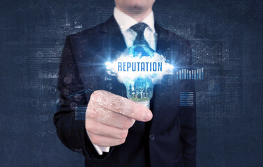 Businessman holding a light bulb, business concept