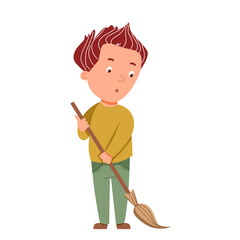 A light-skinned boy sweeps with a broom. Assistance in cleaning, conducting a subbotnik.