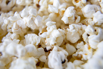 Heap of fresh made popcorn in machine