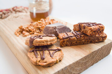 chocolate chip cookies and granola bars - light breakfast - healthy food concept