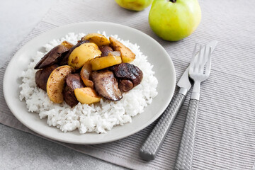 Fried chicken liver with apples and onions
