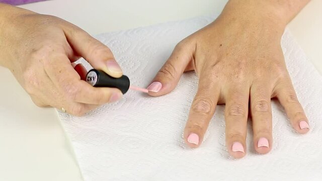 Manicure with led lamp in process. Closeup