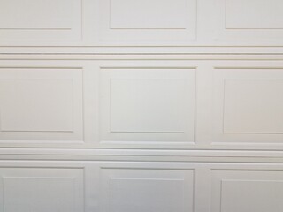 rectangle pattern on closed white garage door