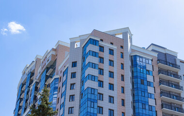 Part of a new residential building in the blue sky