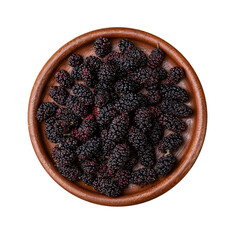 Blackberries in a plate over wooden table