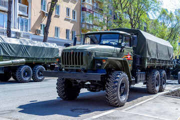 Samara, Russia - May 06, 2021: Military truck Ural-4320 on a city street on a sunny day