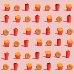 Fast food concept.Burger with french fries in red carton package box and soda on pastel background. Food background.
