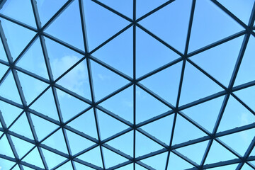 Modern glass roof and sky.
