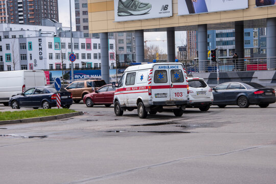 Ukraine, Kyiv - 26 April 2021: Ambulance Silver Ford Econoline car moving on the street. Editorial