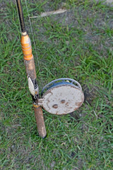 Fishing rod and spinning in the garden