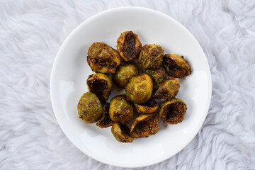 Tasty Goonda or Gunde ki sabzi also known as Gumberry or glue berry vegetable home cooked with Indian masala. Seasonal sabji fruit side dish eaten with chapati or rice. Also known as Lasoda or lasura