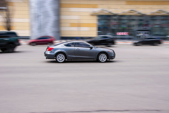 Ukraine, Kyiv - 26 April 2021: Gray Honda Accord EX-L car moving on the street. Editorial