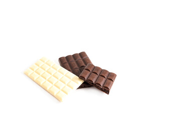 Multicolored chocolate, brown and white chocolate on a white background