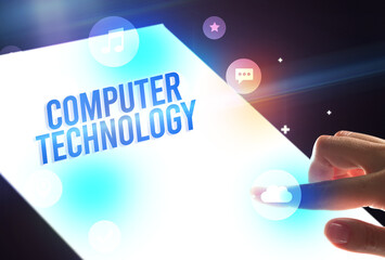 Holding futuristic tablet, new media concept