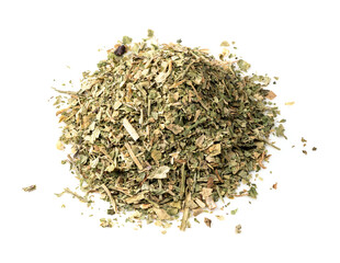 pile of crushed parsley herb closeup on white