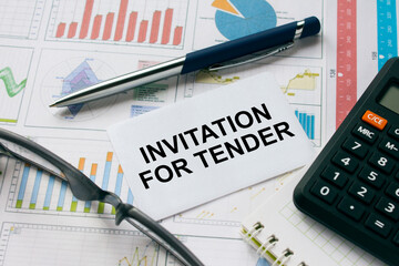 Business card with text Invitation For Tender with, glasses, pen and calculator