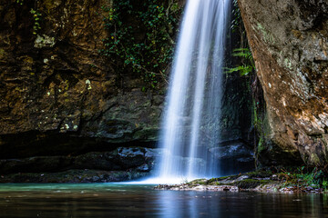 long exposure picture of a waterfall in the wood, hiking in the woods with river flowing	in jijel algeria, 