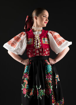 Young beautiful slovak woman in traditional dress. Slovak folklore