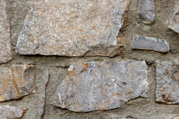 old gray stone wall full frame background