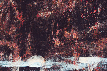 Rusty metal texture. Corroded black iron background. Steel surface rusted spots. Vintage industrial backdrop.