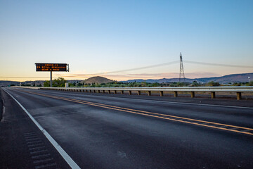 A highway sign warns of Covid-19 during the pandemic