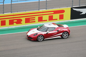 Fototapeta na wymiar Alfa Romeo 4C on portimão circuito - race car