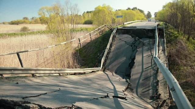 Flood damaged closed highway road, bridge. Cracked asphalt after earthquake. Old broken concrete bridge. Old florida keys broken bridge.