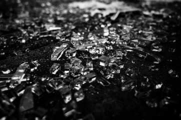 Black and white photo of broken glass