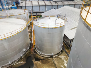 Oil storage tank In industrial areas. Crude oil storage plant For export. Palm oil factories in Asia. Within the industrial plant. Zone tank storage industrial 
