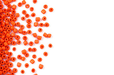 Close up of Orange Beads on the white background. Background or texture of beads. macro,It is used in finishing fashion clothes. make bead necklace or string of beads for woman of fashion.
