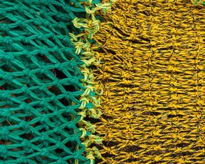 close up detail of the join between green and yellow trawl net