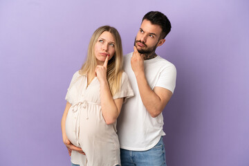 Naklejka premium Young couple pregnant and thinking