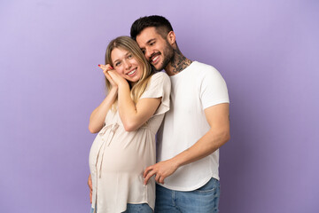 Fototapeta premium Young couple pregnant and happy