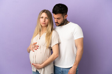 Naklejka premium Young couple pregnant