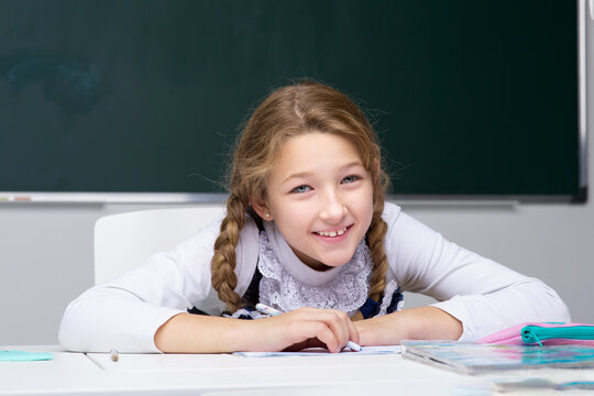 Portrait of cute schoolgirl.Back to school, education concept.