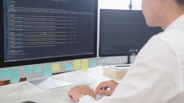 Programming. programmer working in programming website a software and coding technology, writing codes and data code, Programmer Typing Data Code, Working On Project In Software.
