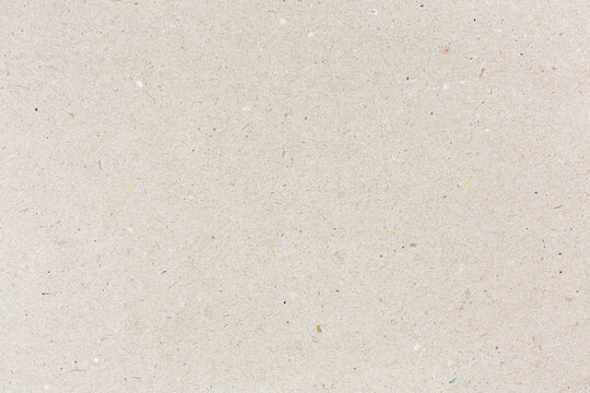 Grey Recycled Craft Paper With Showing Multicolored Paper Fibers. High Detailed Texture.