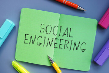 Business concept about Social Engineering with phrase on the sheet.