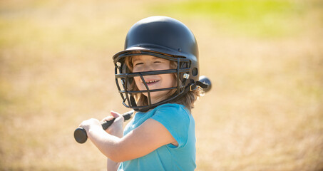 Funny child playing Baseball. Batter in youth league getting a hit. Boy kid hitting a baseball.