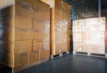 Stacked of Package Boxes on Wooden Pallet at Storage Warehouse. Shipment Boxes. Cargo Export- Import.	