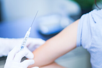 corona virus vaccine injection to child