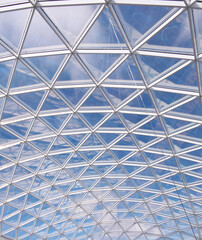 Fototapeta premium Glass roof of modern building windows.