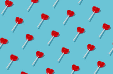Creative flat lay composition with lollipops. Colorful background idea.