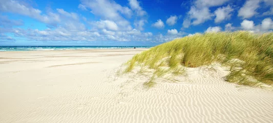 Foto op Plexiglas weiter langer Sandstrand am Meer © Jenny Sturm