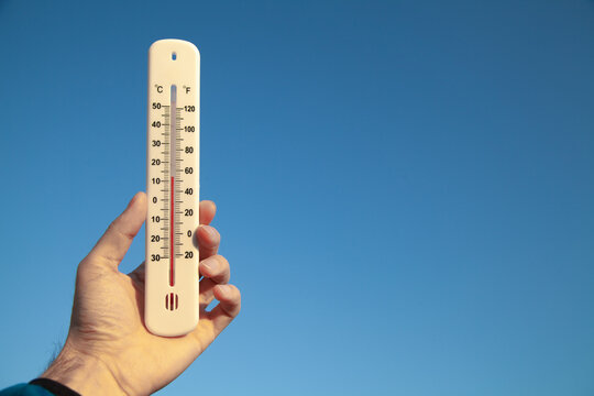 Wooden thermometer outside temperature Stock Photo by ©Egor_1896 247566650