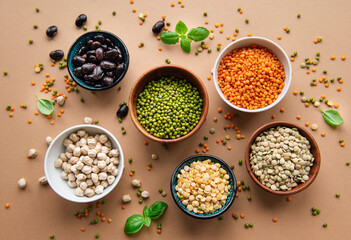 Bowls with different types of legumes