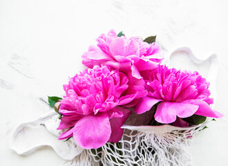 Mesh bag with peony flowers