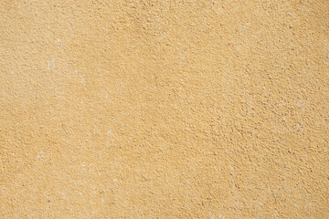 Fototapeta na wymiar Old yellow cement plaster wall texture background